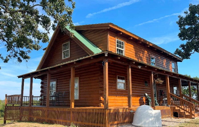 Restored log home viewed from the side