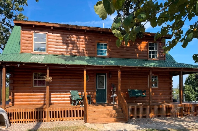 Restored log home viewed from the front